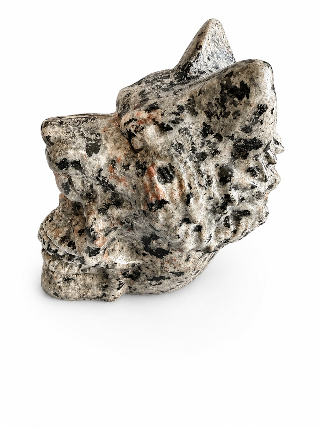 Yooperlite natural crystal skull with wolf on its head carving