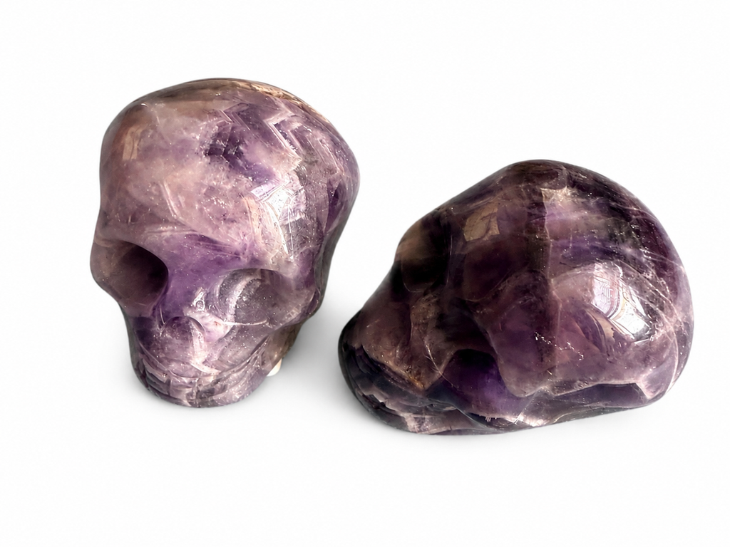 A dream amethyst, natural crystal Skull carving