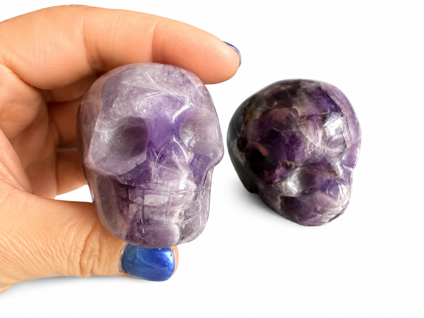 A dream amethyst, natural crystal Skull carving