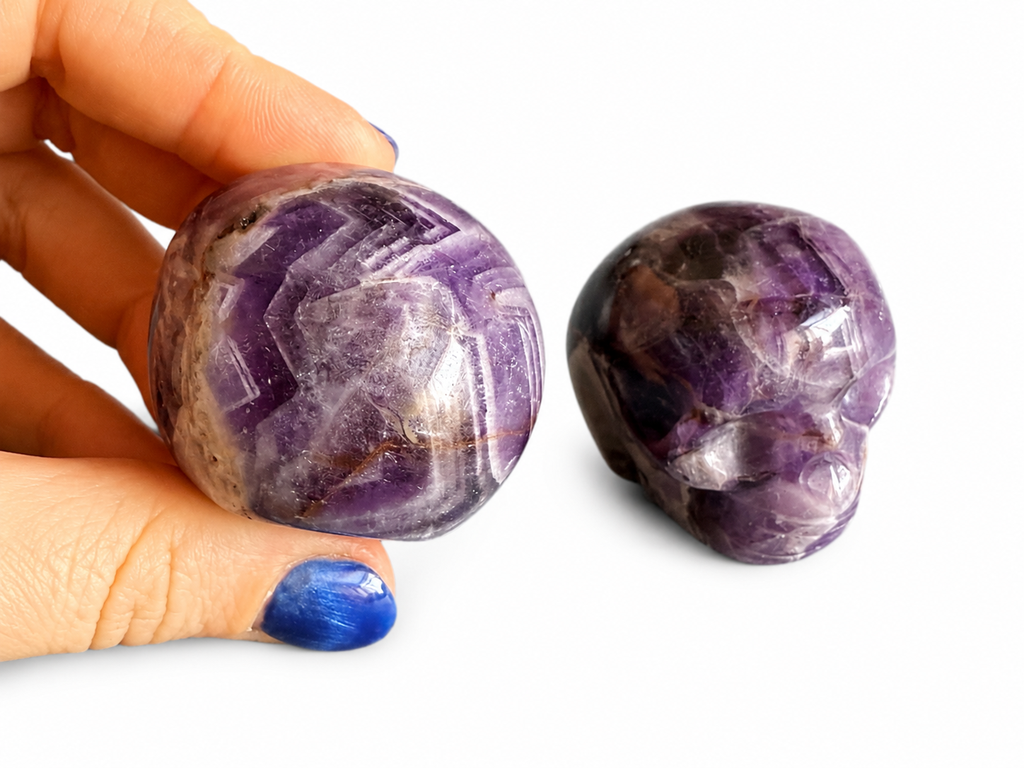 A dream amethyst, natural crystal Skull carving