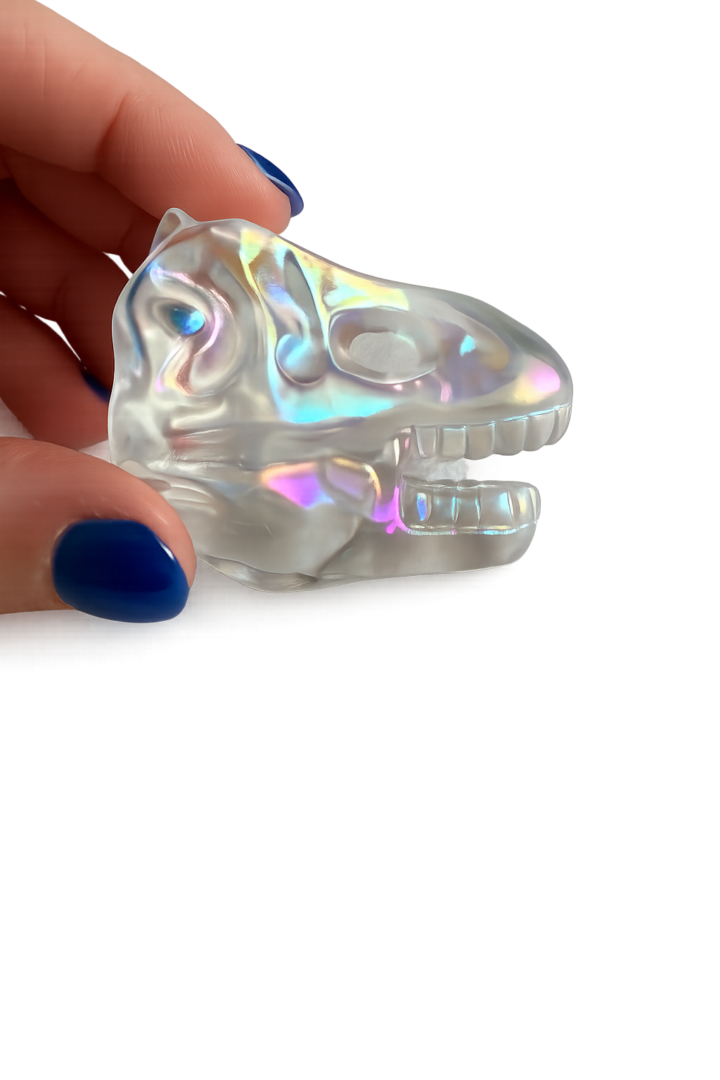 Aura coated clear quartz dinosaur skull carving