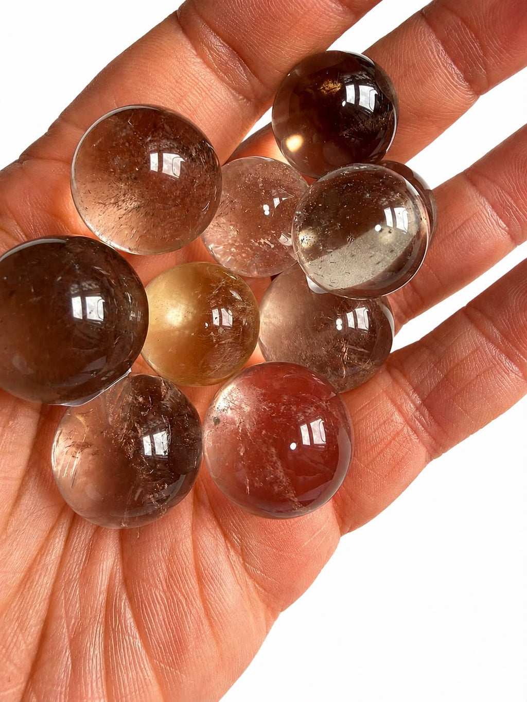 High-quality smoky￼ quartz mini spheres.